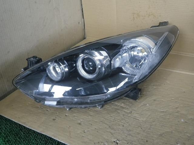 Left Headlight – Mazda Demio